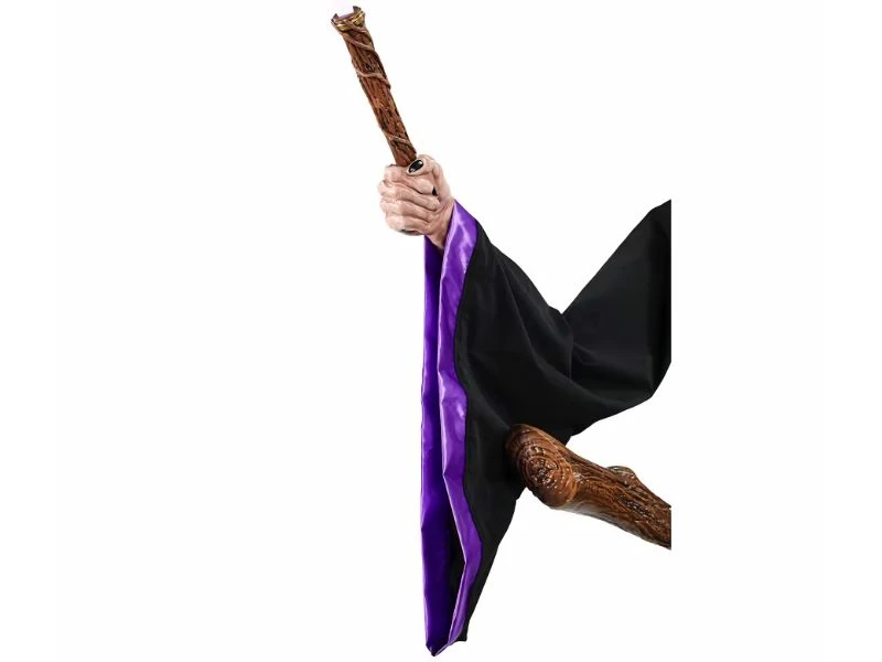 hovering witch halloween animatronic with light up eyes and wand outdoor display