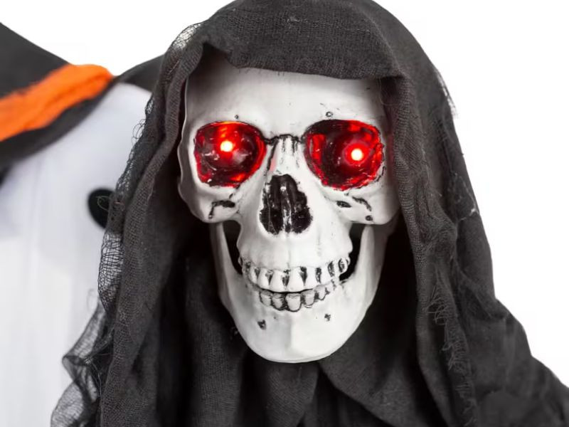 sitting skeleton reaper with animated ghost feature