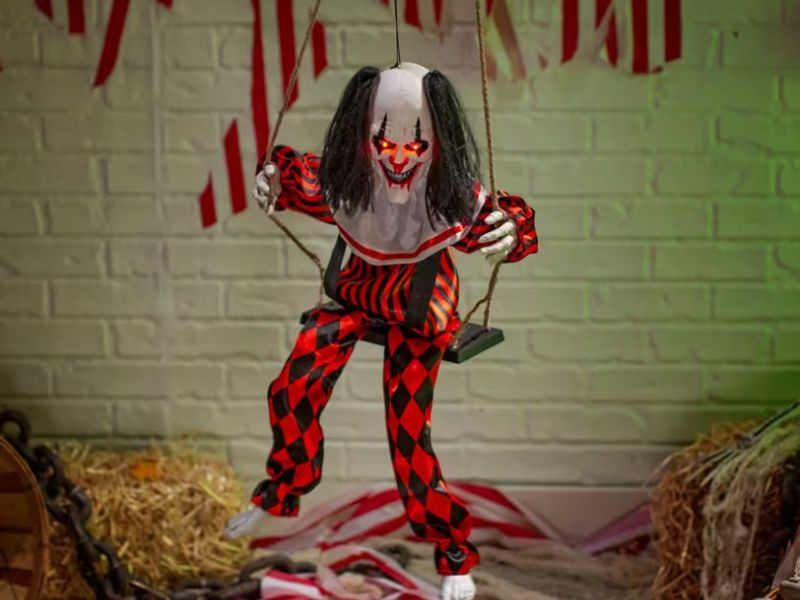 animated singing clown on swing halloween decoration