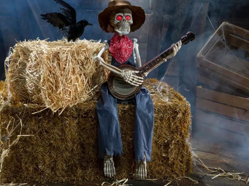 animated skeleton musician halloween prop wearing denim overalls