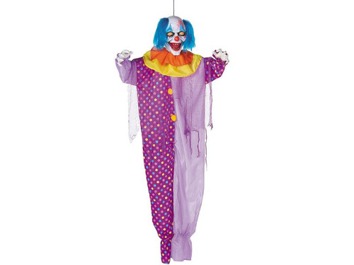 close-up of clown’s eerie face and polka dot costume