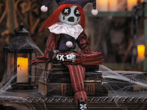 Creepy 24-inch frown clown Halloween doll in black and red outfit
