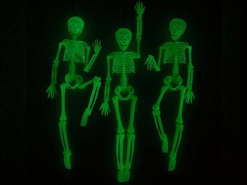 Posable glow skeleton decorations for Halloween party or photo booth