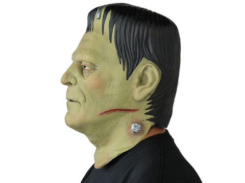 Adult wearing Frankenstein monster latex mask for Halloween costume