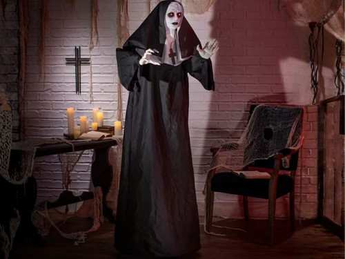 animated surprise nun halloween decoration with glowing eyes