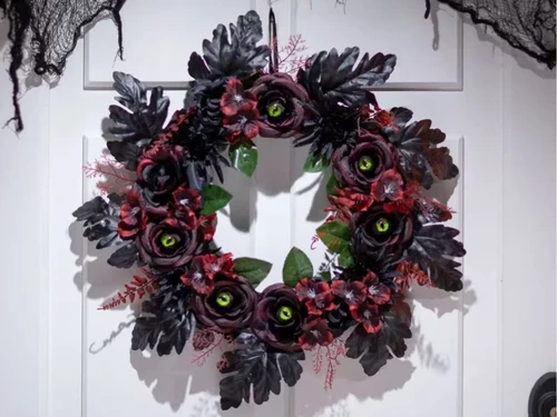 dark floral halloween wreath with hidden eyes