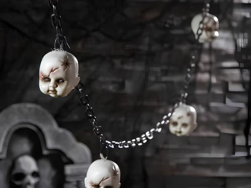 mutilated doll head garland halloween decoration