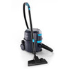 A Nilfisk VP400 commercial canister vacuum is shown on a clean white background. The vacuum features a compact dark gray body with bright blue accents, large rear wheels, and a front caster for easy maneuverability. A flexible black hose connects to a straight wand with a blue ergonomic grip. The vacuum head is attached at the bottom of the wand, positioned as if ready for cleaning. The overall design looks durable, modern, and professional—ideal for commercial cleaning in hotels, offices, and facilities.