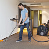 TASKI procarpet 45 upholstery cleaning with hose and wand attachment on commercial carpet in hotel room