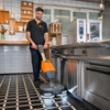 TASKI ULTIMAXX 360 compact auto scrubber cleaning commercial kitchen tile floor