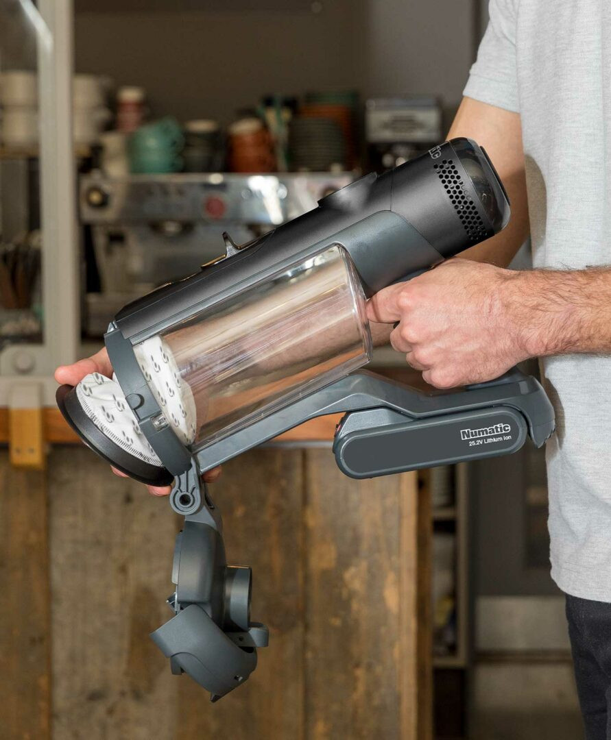 Dust free pod emptying system on NaceCare The Quick cordless vacuum using sealed filter pod