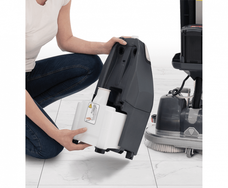 Removable solution tank on the 440 NX (formerly 244NX)compact scrubber for easy filling, cleaning, and maintenance.