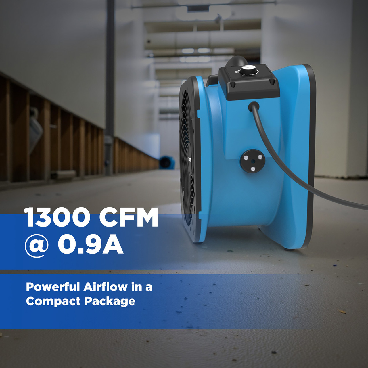 XPOWER P-56A axial air mover operating in a hallway delivering 1300 CFM airflow for water damage restoration and drying applications.