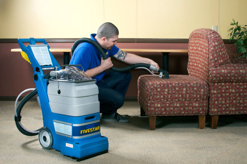 EDIC Fivestar carpet extractor used for upholstery cleaning with hose tool