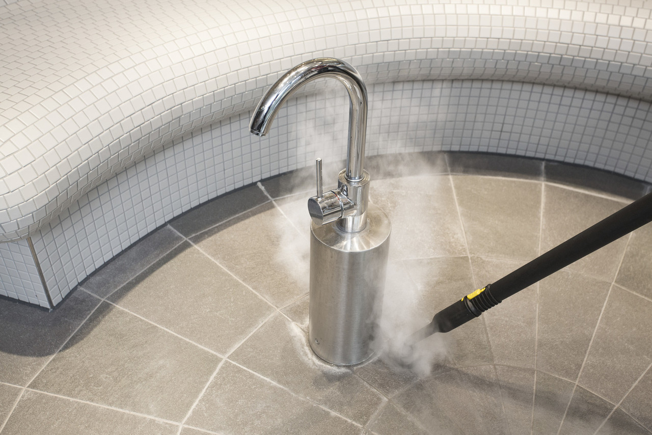 SG 4/4 Commercial Steam Cleaner with Transport Cart | Karcher 9.841-414.0 in use upclose sink image