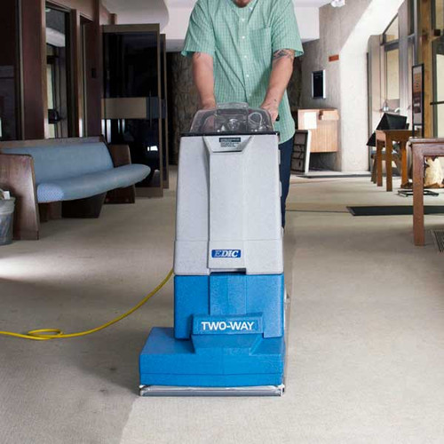 EDIC Supernova two-way carpet extractor operating in forward cleaning mode