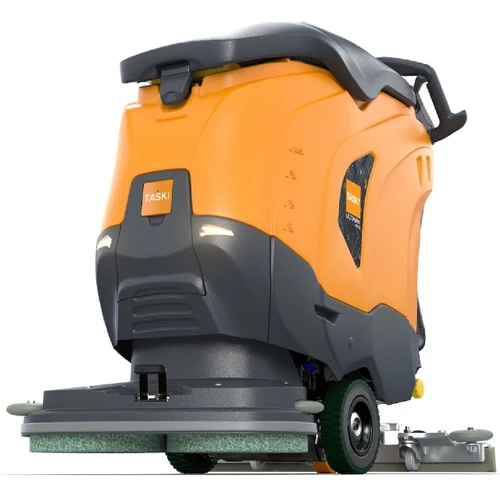 Front view showing the TASKI ULTIMAXX 1900 DD65 dual disc scrub deck for commercial floor cleaning.