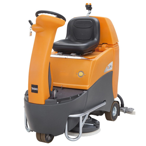 TASKI swingo 2500 ride-on auto scrubber shown from the front angle with steering column and operator seat visible, highlighting the compact design and maneuverability.