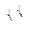Script ''Peace'' with Clear Crystals White Clear Crystal Diamond-Shape Earrings