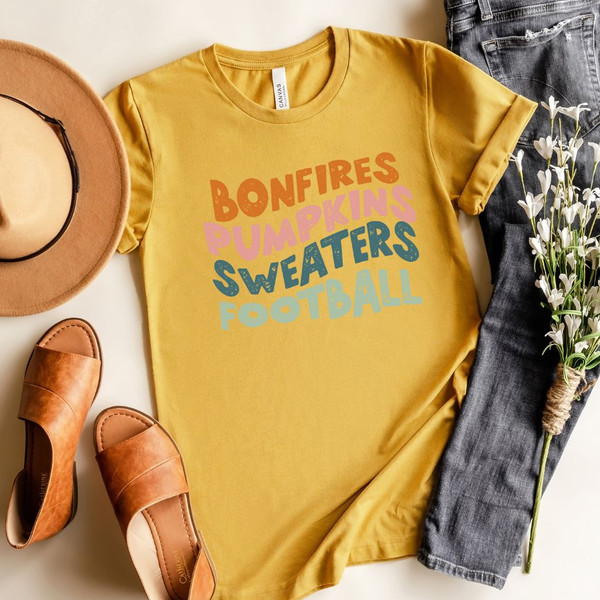 'Bonfires Pumpkins Sweaters Football' Short Sleeve Graphic Tee product image