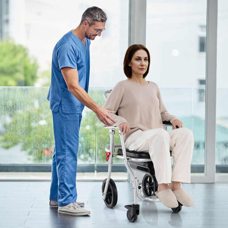 4-in-1 Foldable Bedside Commode Chair with Brakes, Bucket, & Footrest product image