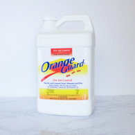 1 gallon bottle of Orange Guard Fire Ant Control, all-natural pest treatment.