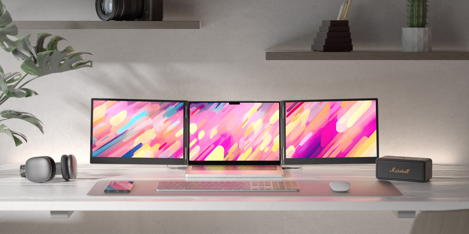 A side-by-side view of two premium desk setups, each showcasing a laptop seamlessly expanded into a tri-screen display with the Monduo portable monitor accessory.