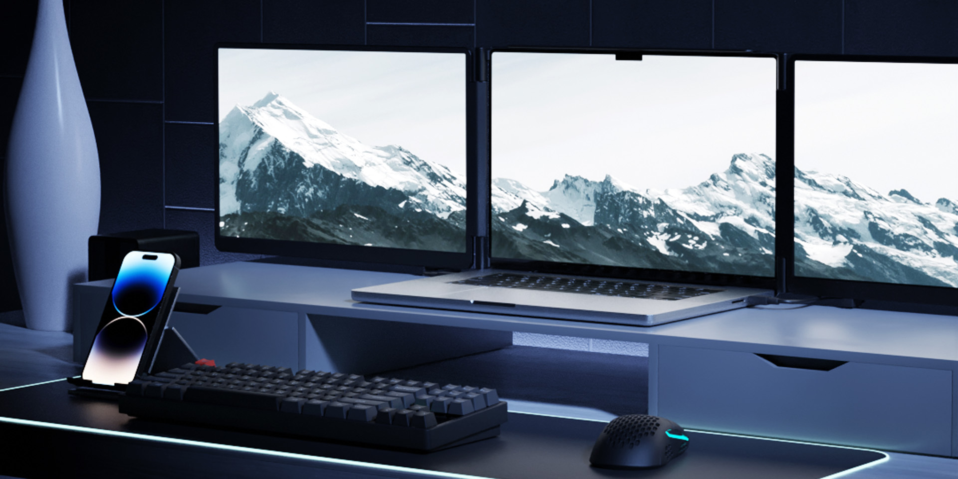 A side-by-side view of two premium desk setups, each showcasing a laptop seamlessly expanded into a tri-screen display with the Monduo portable monitor accessory.