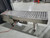 Trio-Pac bi-directional motorized roller conveyor for case, 90in long x 20in wide