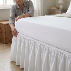 white-180-thread-count-percale-base-valances-lifestyle-woman-fitting-tailored-valance-around-bed-base