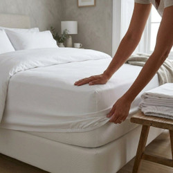 180-thread-count-percale-fitted-sheets-16-inch-extra-deep-lifestyle-stacked-white-fitted-sheets-showing-deep-pocket-construction