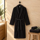 black-terry-towelling-bath-robe-travertine-wall