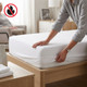 flame-retardant-fitted-sheets-bs-7175-crib-7-lifestyle-hands-fitting-elastic-corners-on-bed-no-open-flame-symbol-fire-safety-certified