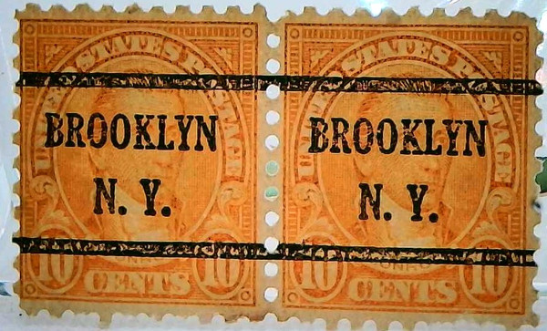 1923 10 Cent Orange Perf 10 Horizontal Pair, Scott# 562C Vibrant color "Brooklyn" precancel, Very Rare Pair well centered, should be perf 11 one of the wheels became defective. This is an out of gauge, there are no duplications. Census shows two unused singles, eleven used singles, one single a pair and two pairs, for a total of two unused and sixteen used except one pair have precancels. Census no. 562C-CAN-PR-14.