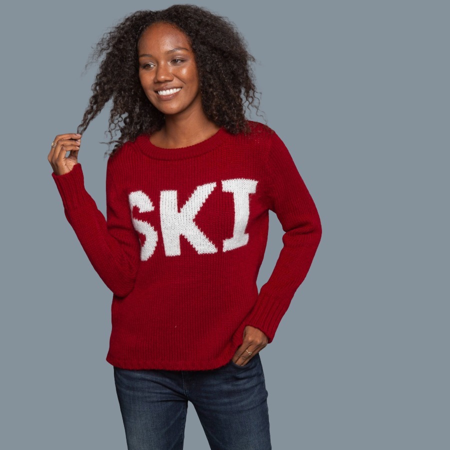 Woman wearing bright red sweater