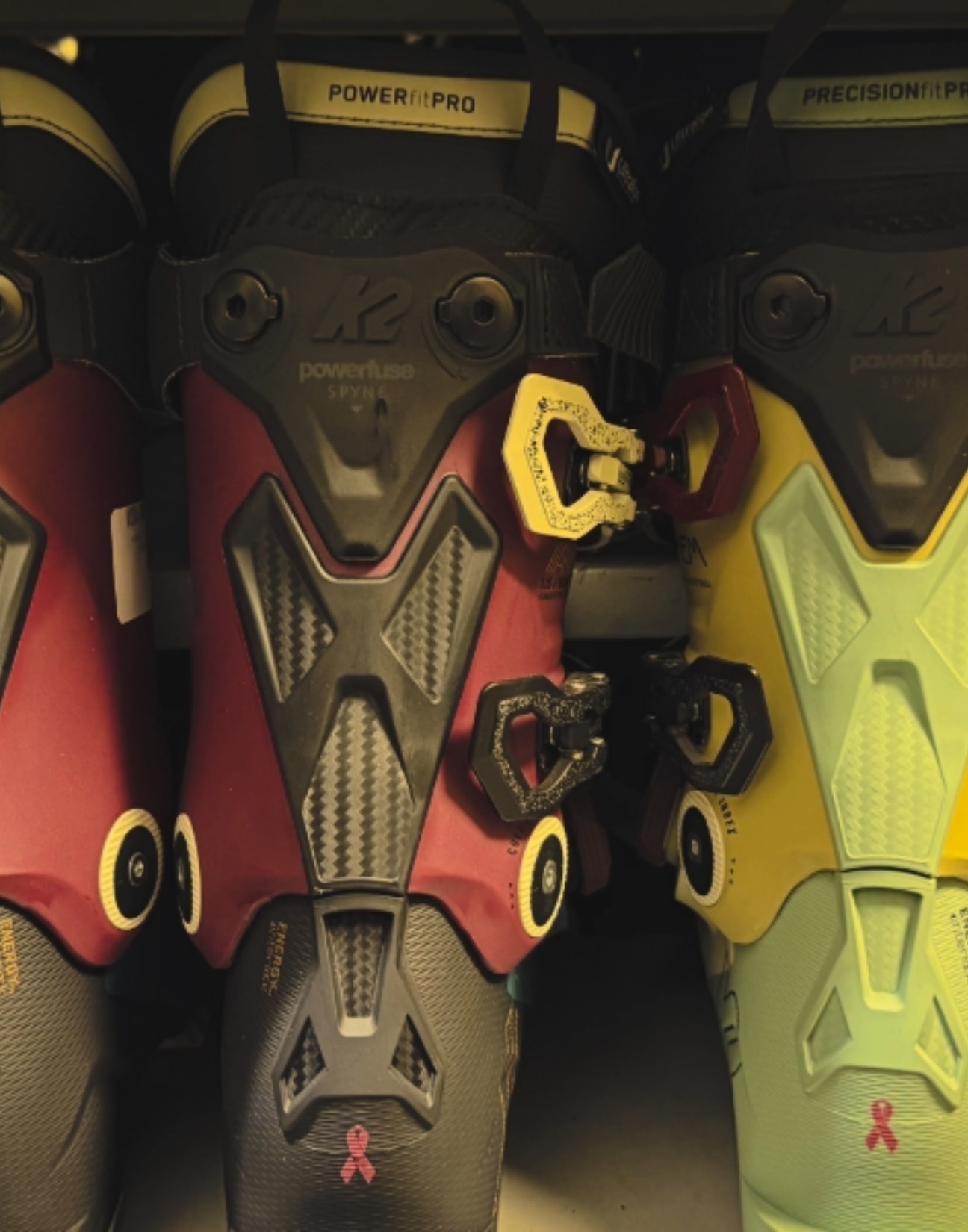 Close up of the back of ski boots in the outdoor divas ski boot rack.