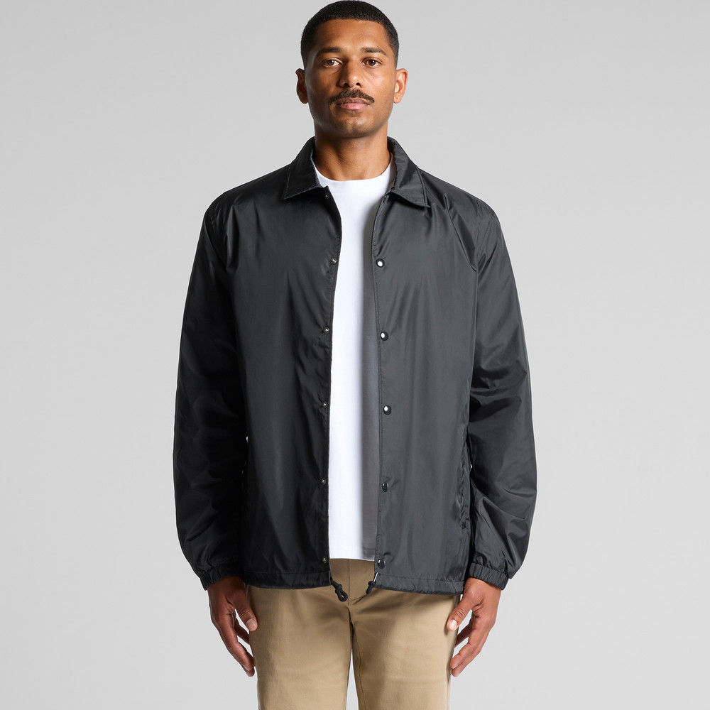 Black coach jacket with a pointed collar, snap fastenings and straight lower edge