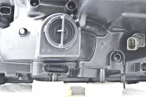 HELLA Right Headlight Assembly 263036461