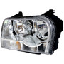 Crown Automotive 4805757AG Left Headlight for 05-12/1/06 Chrysler LX 300 w/ Halogen Bulbs w/ Chrome Bezels, Includes Bulbs, Sockets, and