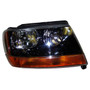Crown Automotive 55155128AB Right Headlight w/o Headlamp Leveling Device for 99-02 Jeep WJ Grand Cherokee w/ Laredo Package, USA & Canada