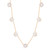 Gold daisy necklace with seven crystal-studded floral charms evenly spaced along a delicate chain.