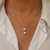 Rose Gold Pave Circle With Drop Pearl Pendant