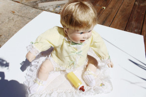 Vintage 1990 Danbury Mint Playing Footsie Porcelain Doll, Blanket & Bottle. New Condition, No Box. Inventory stock: 1   1.5LBS    $39.99