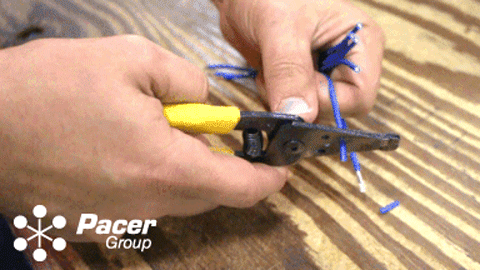 Wire cutter stripper in use Wire cutter stripper in use