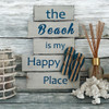 Beach-themed wooden sign with thong sandal decor, expressing love for the coast in a cheerful, rustic style.