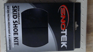 Genuine Sno-Tek Non-Abrasive Skid Shoe Kit. Black color. 72001300