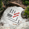 A1Armory AR-15 Anodized Red Anti-Rotation Trigger Hammer Pin Set LYING ON A ROCK NEAR A RIVER