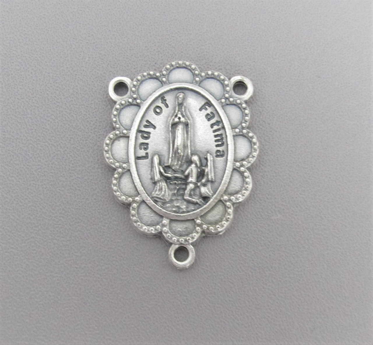 Lady Fatima Scallop Rosary Center