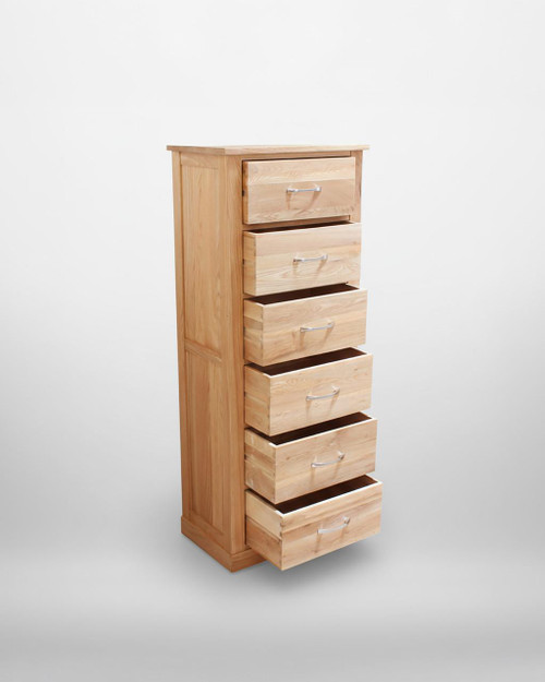 Mobel Oak Tallboy (6 Drawer) COR12A, wooden tallboy with six spacious drawers and sleek metal handles, crafted from oak wood with a natural finish. Mobel Oak Tallboy (6 Drawer) COR12A, wooden tallboy with six spacious drawers and sleek metal handles, crafted from oak wood with a natural finish.