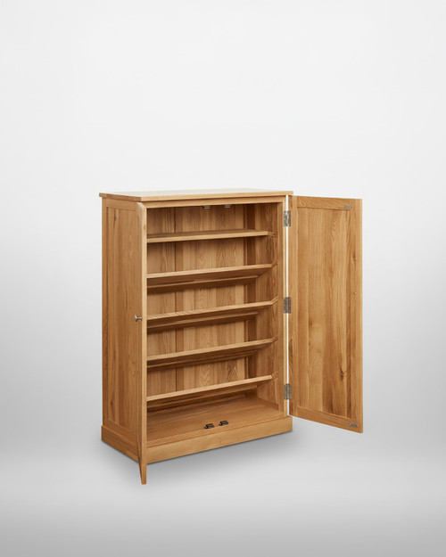 Mobel Oak Shoe Cupboard COR20A, wooden shoe storage cabinet with multiple shelves and an open door showcasing interior compartments. Mobel Oak Shoe Cupboard COR20A, wooden shoe storage cabinet with multiple shelves and an open door showcasing interior compartments.